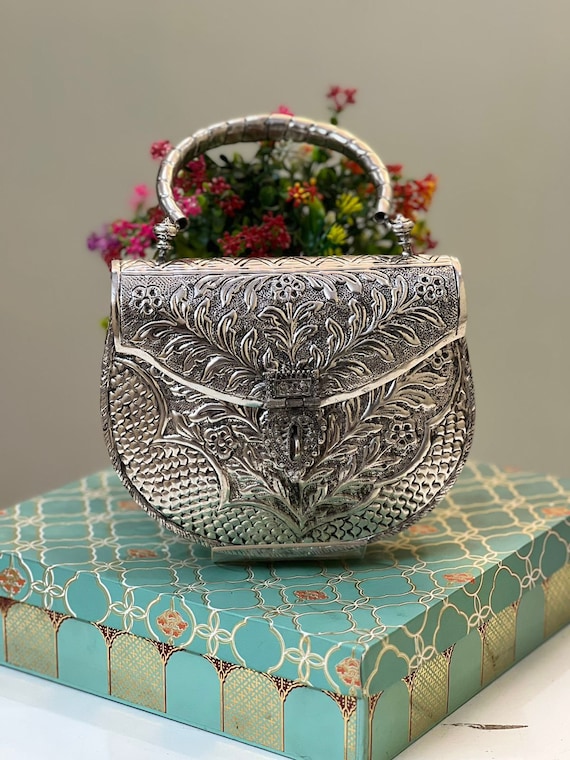 Metal sales clutch purse