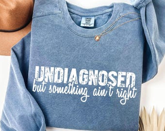 Undiagnosed But Something Ain’t Right Comfort Colors Shirt, Undiagnosed Shirt Funny Quote, Mental Health Humor Tee,Something Ain’t Right Tee