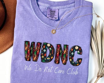 WDNC - We Do Not Care Club Christmas Theme Shirt, Xmas Menopause Perimenopause Women, Menopause Attitude Shirt, Comfort Colors Tee