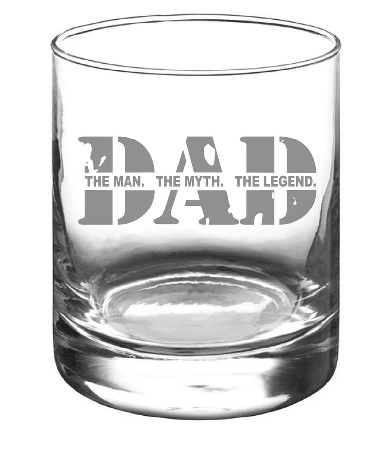 May include: A clear glass tumbler with the word "DAD" etched in a distressed font. The text below reads "THE MAN. THE MYTH. THE LEGEND."