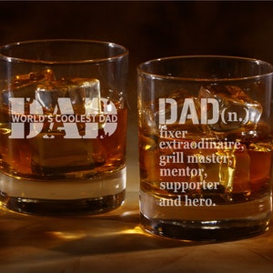 May include: Two clear glass tumblers with the word "DAD" etched on them. One tumbler says "World's Coolest Dad" and the other says "DAD (n.) fixer extraordinaire, grill master, mentor, supporter and hero."