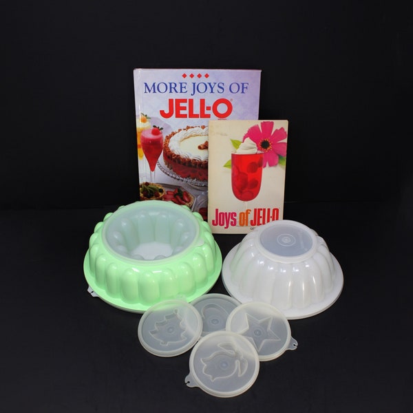 A vintage Jell-O-A-Rama: 2 vintage Tupperware Jell-O molds, 1 Joys of Jell-O cookbook, 1 More Joys of Jell-O cookbook, 1 bonus green Jell-O