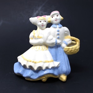 Vintage ceramic Dutch boy and girl planter flower pot vase