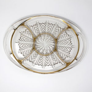 Vintage oval clear cut glass relish tray with handles. Gold outlines all 5 sections.