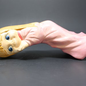 Vintage Scioto Ceramic girl figurine, lying down [in the hand of the Lord--minus the hand of the Lord], pink nightie, blonde
