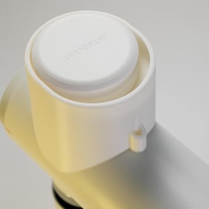 May include: Close-up of a white object with a cylindrical body and a rounded top. The top has the word "INTROVERT" printed on it. The object appears to be made of plastic and is set against a plain white background.