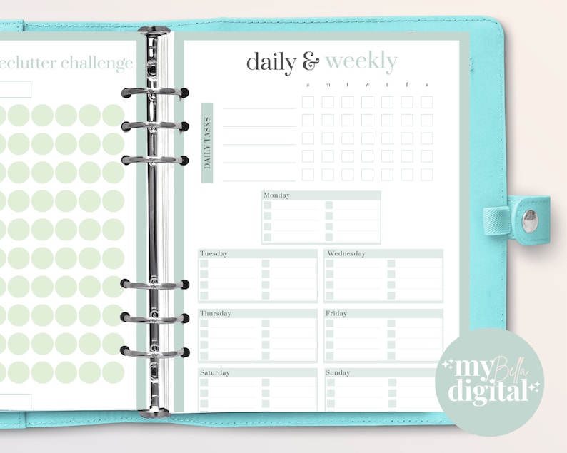 May include: A teal binder with a daily and weekly planner insert. The planner pages have a light green and white design with sections for daily tasks and a declutter challenge. The text "daily & weekly" is at the top.