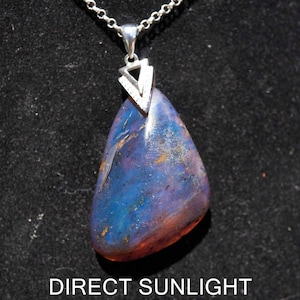 Natural top quality blue amber dominican pendant teardrop shape polished 925 sterling silver