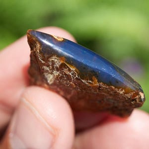 rare blue amber cabochon gemstone, authentic Dominican blue amber, hand-polished cabochon is crafted from genuine raw amber fossilized