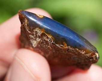 rare blue amber cabochon gemstone, authentic Dominican blue amber, hand-polished cabochon is crafted from genuine raw amber fossilized