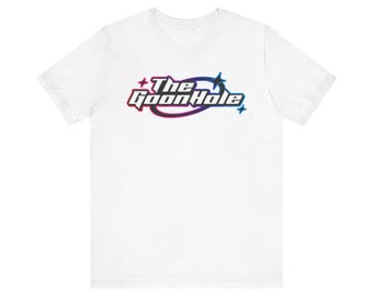May include: White t-shirt with a colorful graphic design that says "The Goon Hole" with stars on either side of the text.