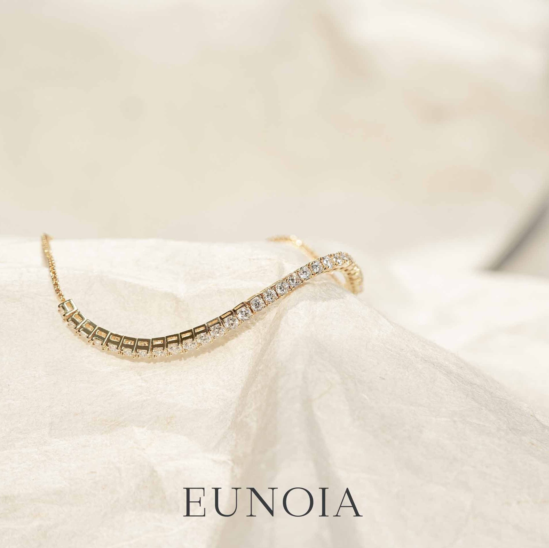 Half carat diamond tennis bracelet hot sale