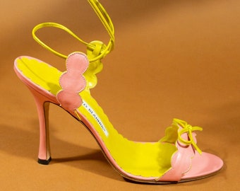 Bubblegum pink and yellow leather scalloped strappy sandals.