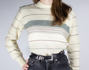 Cream striped pull over knit sweater.