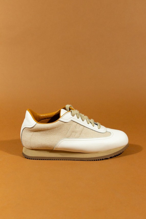Hermes Paris canvas and leather sneakers.