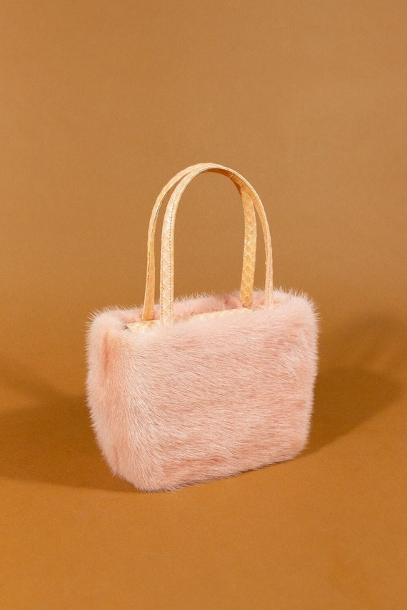 Vintage designer fluffy pink mink fur handbag.