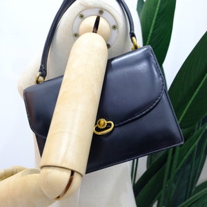 Authentic vintage GUCCI black leather handbag