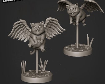 Könnte beinhalten: Zwei graue Katzenfiguren mit gefiederten Flügeln, montiert auf Ständern mit Grasakzenten. Die Katzen haben einen mürrischen Gesichtsausdruck. Der Text "GOONMASTER" befindet sich in der oberen linken Ecke.
