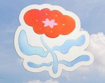 May include: A sticker of a stylised flower with a red and orange blossom and blue leaves against a blue sky background.