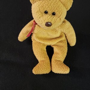Vintage 1993 curly beanie baby retired