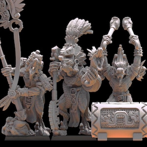 May include: A set of four gray, detailed, miniature figurines of reptilian creatures with feathered headdresses. The figures are holding various objects, including a staff, a drum, and a pair of clappers. A small, gray, rectangular drum with intricate carvings is also included.