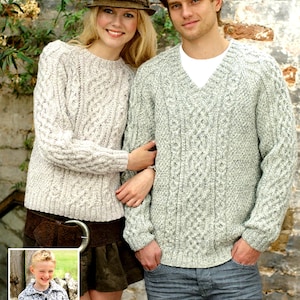 May include: Three people wearing cable knit sweaters in various shades of gray. The sweaters have a textured pattern and a v-neck design.