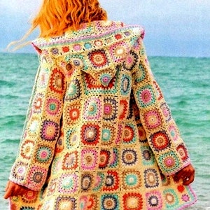 May include: A crocheted hooded cardigan with a colorful patchwork design. The cardigan is made of squares with different colors and patterns, including pink, blue, green, yellow, and orange.