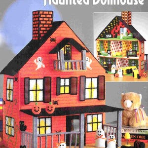 May include: A plastic canvas haunted dollhouse with orange walls, a black roof, and a brick chimney. The structure features windows with black shutters, a front porch, and a balcony. Decorations include ghost and pumpkin motifs. Text reads: plastic canvas Haunted Dollhouse.