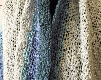 Envoltura gris, azul y verde azulado con bolsillos