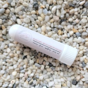 May include: White aromatherapy inhaler with a label that reads "Rosemary Aromatherapy Inhaler - memory - focus - uplifting - study aid".