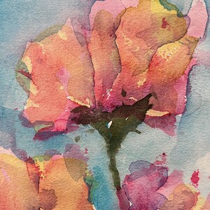 May include: A handmade wooden sign with the text "Welcome to our home" in a handwritten style. The sign is painted white with black lettering and a distressed finish, perfect for home decor.