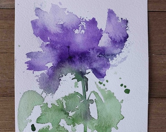 May include: Watercolor painting of a purple flower with green leaves and splatters of paint on a white background. The artist's signature, "ALEY", is in the bottom right corner.