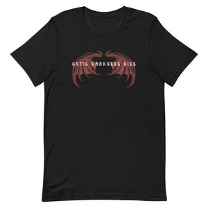May include: Black t-shirt with a red graphic of a pair of wings and the text "UNTIL DARKNESS DIES".