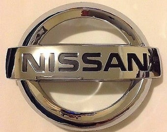 Nissan Altima Murano Quest Rogue Front Radiator Grille Chrome Emblem OEM NEW