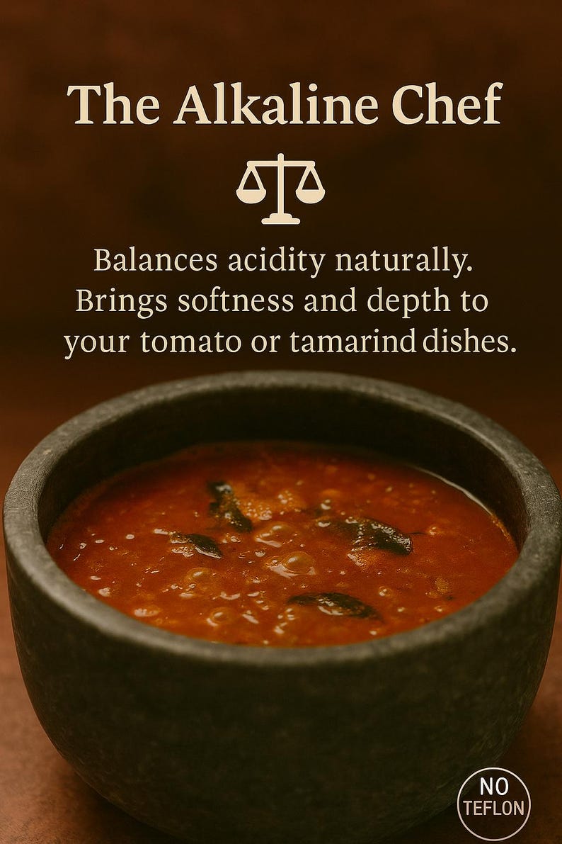 Soapstone cookware bowl filled with tomato curry — highlighting its natural alkalinity that balances acidity and enhances flavors in tomato or tamarind dishes. Non-toxic, no Teflon, perfect for healthy slow cooking.