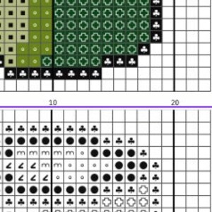 May include: Cross stitch pattern featuring a green shamrock with black and white clover accents. The pattern is on a white grid background.