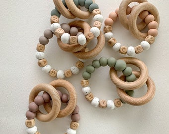 | à hochets personnalisé Emery | mouchetée | à hochet en silicone et en bois | en bois Produits pour bébés neutres | Montessori