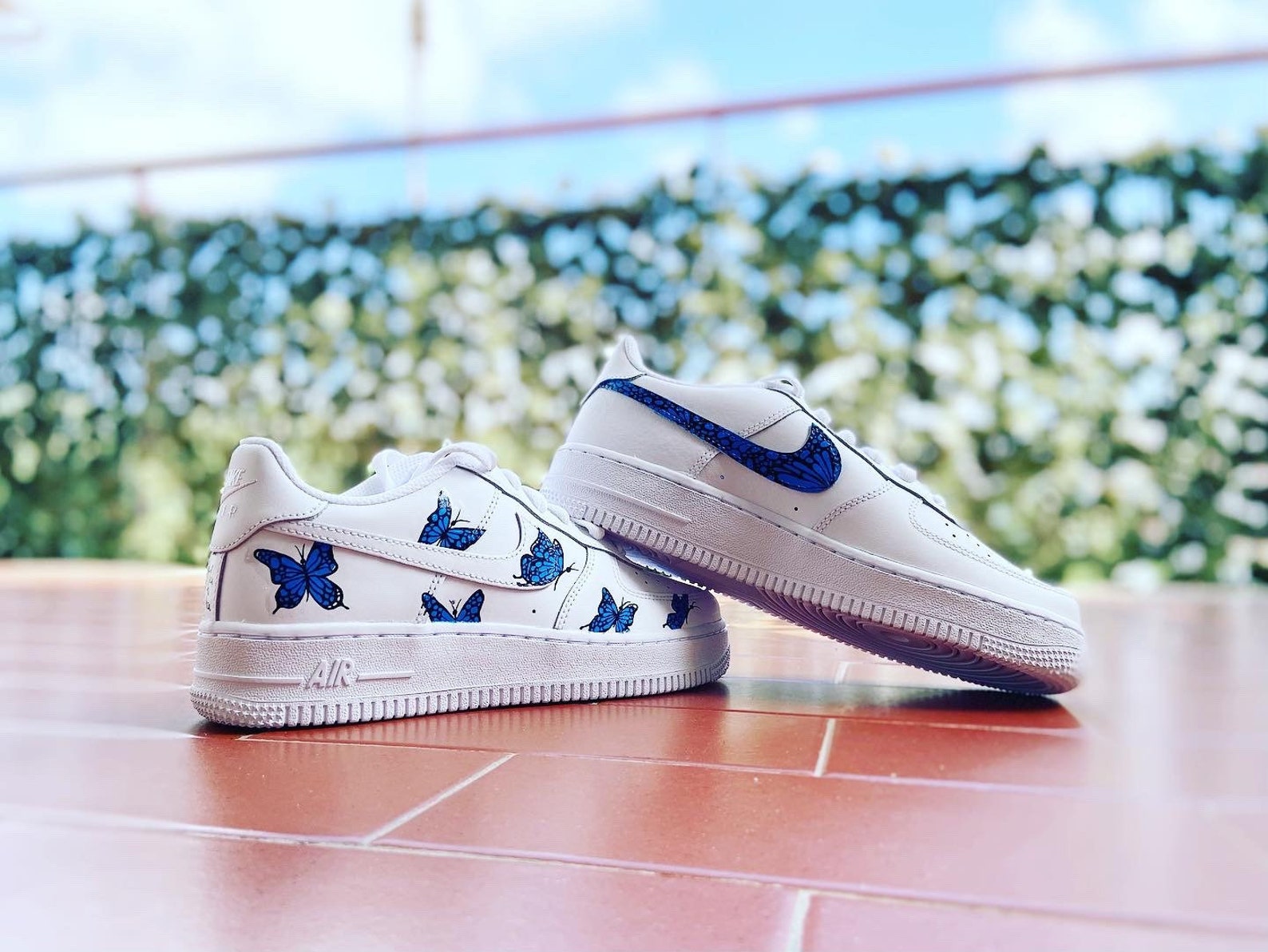 white air forces with blue butterflies