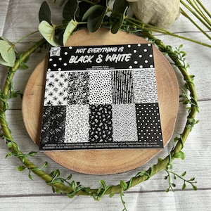 Blok papieru ze wzorem czarno-białym, materiały do bloków papieru do robienia kartek, materiały do scrapbookingu, blok papieru do majsterkowania, materiały do rękodzieła papierowego.