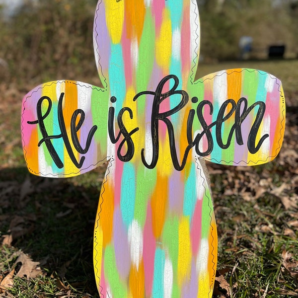 He is Risen Multi colored crackled cross door hanger