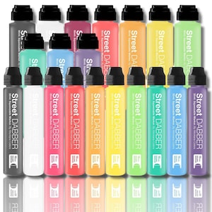 May include: A set of 20 paint markers in various colors, including black, white, pink, orange, yellow, green, blue, and purple. The markers are labeled "Street Dabber" and are 30 ml squeezable markers by Montana Colors.