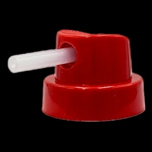 May include: Red spray paint cap with a white plastic nozzle. The cap is designed for use with aerosol spray paint cans.