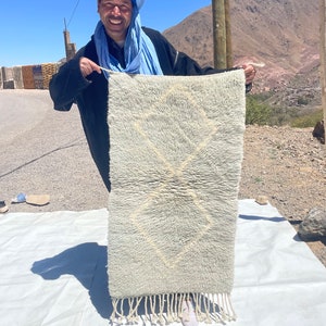 Moroccan rugs, Moroccan carpets, handmade rugs, authentic rugs, intricate patterns, vibrant colors. Size is 120x50 cm