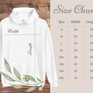 May include: Size chart for a white hoodie with a green leaf design. The chart shows the width and length of the hoodie in inches for sizes S through 5XL.