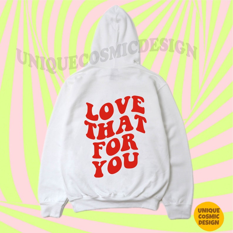 May include: White hooded sweatshirt with the text "LOVE THAT FOR YOU" in red retro-style lettering on the back.