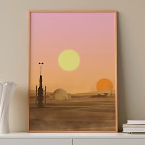 Puede incluir: Una impresión artística enmarcada que representa un paisaje desértico bajo un atardecer de dos soles. La obra presenta una silueta de paisaje urbano y dos soles en tonos amarillos y naranjas sobre un cielo rosa y naranja. Un jarrón blanco está en primer plano.