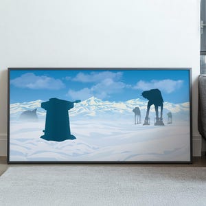 以下が含まれることがあります： 青い空と雲のある雪景色を描いた額入りのアートプリント。大きな砲塔とAT-ATウォーカーのシルエットが見えます。アートワークは白い壁に展示されています。