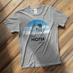 Visit Hoth Travel Poster T-Shirt | Retro Tee | Star Wars Inspired | AT-AT Walker Vintage Graphic | Unisex Gift | Star Wars National Park
