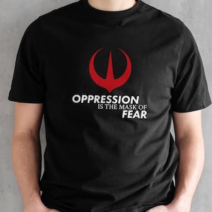 Maglietta Andor Rebel: Star Wars Rebels - &quot;L&#39;oppressione è la maschera della paura&quot;