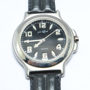YVES LAFFOND chrome watch with black dial, chrome numerals and indexes